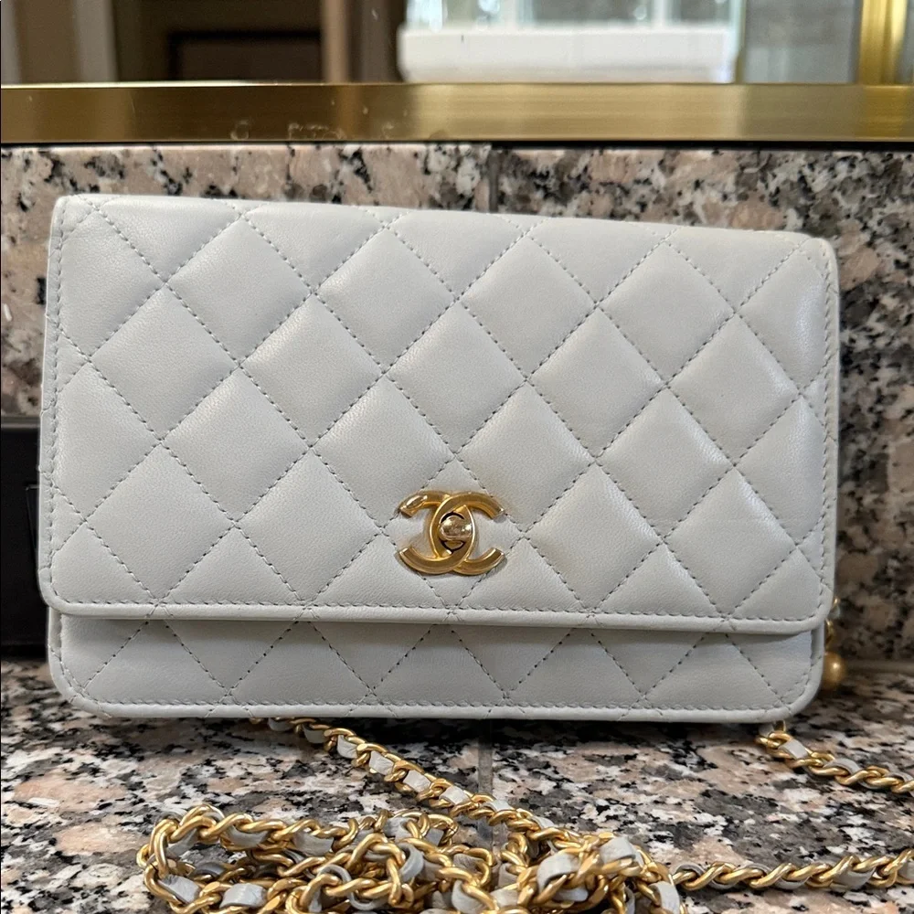 Chanel Light Blue Quilted Crossbody Bag with Gold Accents - Picture 1 of 6